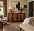 This eight-drawer vintage dresser has a rich mahogany tone and a classic Georgian block-front shape, with a serpentine...