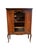 An elegant antique Queen Anne style display cabinet crafted in warm walnut, dating to circa 1920s. With its graceful...