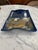 Rectangular blue fused glass tray or decorative dish featuring an abstract marbled brown and gold design one side and...