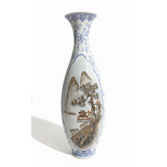 A delicate vintage Chinese eggshell porcelain vase attributed to Jingdezhen, beautifully decorated with traditional...