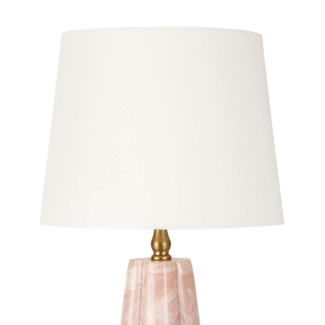 Looking for a designer accent? Replicated to resemble Pink Quartz it's distinctive color way makes this mini lamp stand...
