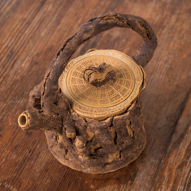 A Yixing Zisha ‘tree stump’ tea pot by 陳泰源 Chen Taiyuan (b.1963, Taiwan). 5 inches wide by 3 ⅜ inches deep by 4 ¾ inches tall