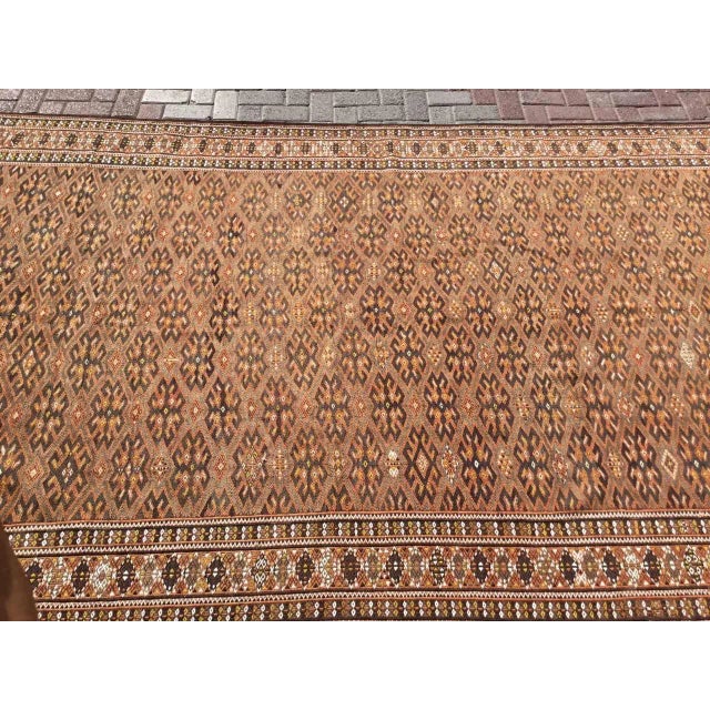 This beautiful, vintage, handwoven kilim is approximately 70 years old. It is handmade, of very fine quality hand spun...