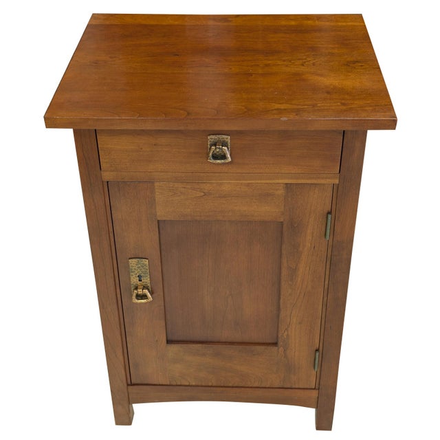 A finely crafted example of American Arts & Crafts design by Stickley, executed in warm-toned cherry with a rich, hand-...