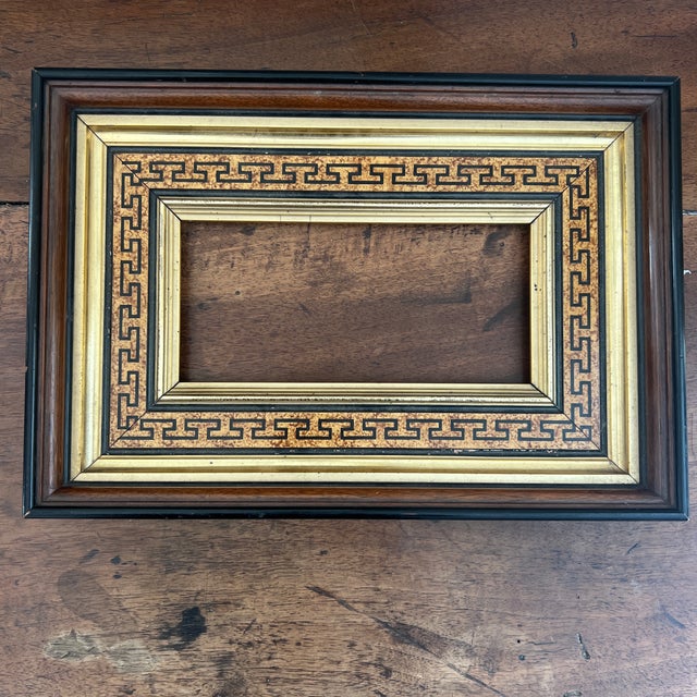 Opening is approx 9 x 4.5” Antique Neoclassical Mahogany and Parcel Gilt Art or Mirror Frame