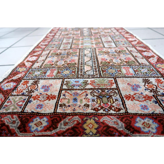 Handmade Vintage Tunisian Silk Rug 1.6' x 3.7' (51cm x 97cm), 1970s Introducing our Handmade Vintage Tunisian Silk Rug...