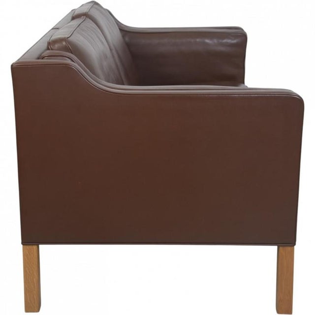 Børge Mogensen 2.seater sofa, model 2212, upholstered in original brown leather, and with legs of oak. The sofa is from...