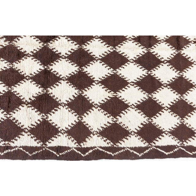Mid-20th century Moroccan diamond design, brown, beige handmade wool rug Size: 4'5" × 10'2" (134 × 309 cm) This vintage...