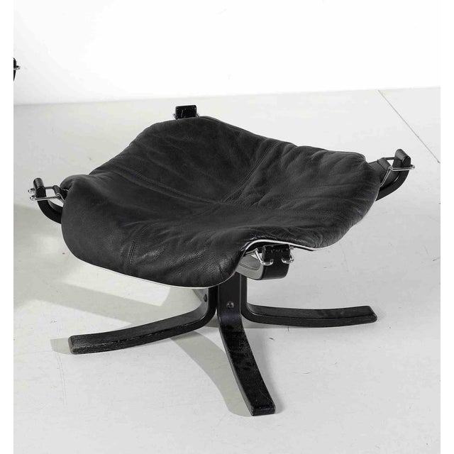 Armchair with Footrest by Sigurd Ressel for Poltrona Frau, 1980. Armchair 79,00 x 99,00 x 80,00. - Footrest 39 x 59 cm....