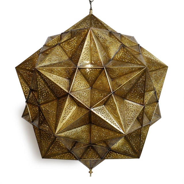 Vintage Indian brass pendant light is masterfully crafted, formed from a complex constellation of faceted, hand-pierced...