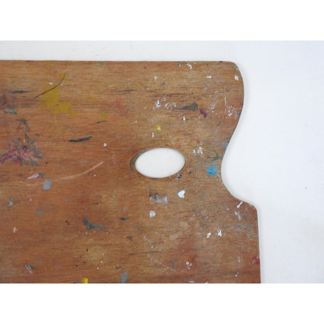 Vintage mid 20th century wood artist palette. Authentic light use, has been varnished at some point. Use it or hang it on...