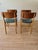 Set of 4 Danish mid-century dining chairs in solid oak with beautifully shaped teak backrests. The chairs have been...