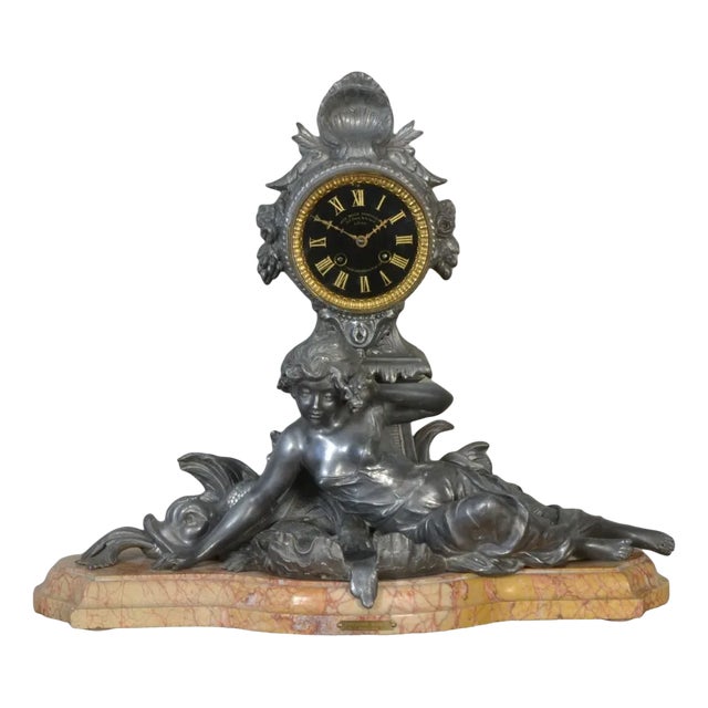 French Mantel Clock Le Premier Miroit from Francois Moreau For Sale