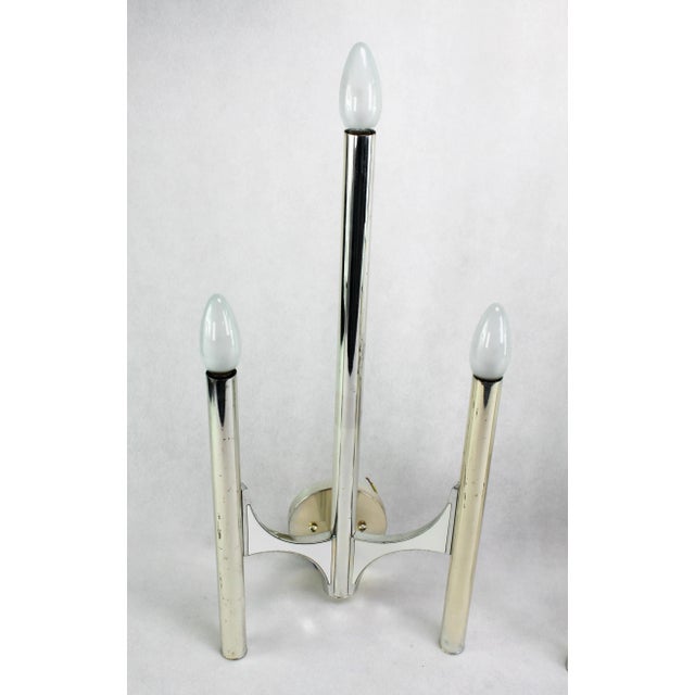 These rare, large wall lamps are a real design classic from the 60s / 70s. The sconces are original and give a pleasant...