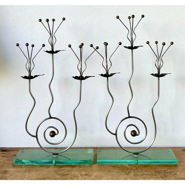 Inject a dose of whimsical 1980s Postmodern flair into your decor with this striking pair of vintage sculptural...