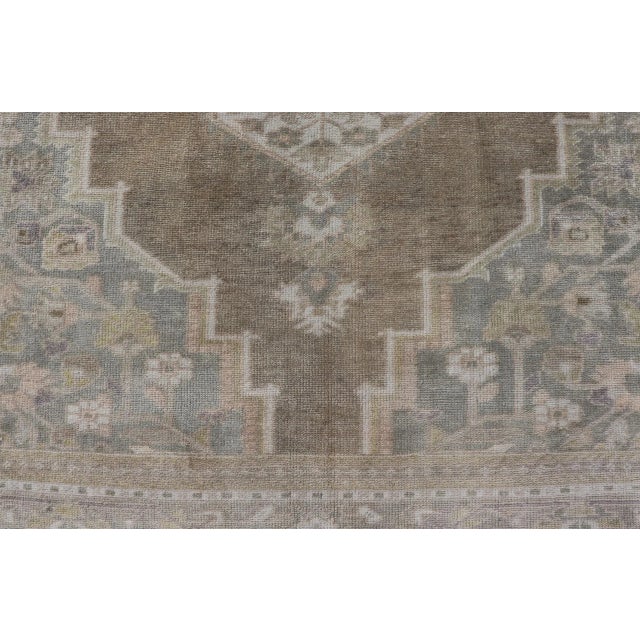 Coffee Mid 20th Century Mid 20th Century Vintage Turkish Oushak Rug From Turkey With Muted Colors and Floral Medallion For Sale - Image 8 of 12