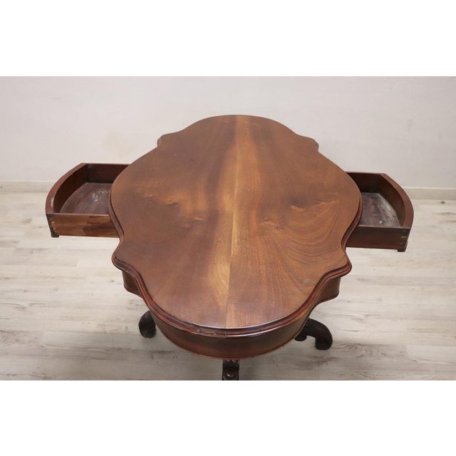 This exquisite Italian table, crafted in the mid-19th century during the Louis Philippe period, showcases the timeless...
