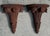 Vintage Neoclassical architectural wall corbels featuring carved acanthus detailing, fluted supports, and decorative...
