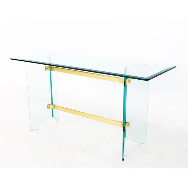 Spectacular Pace glass entry/foyer console or sofa table with brass accent hardware. Measures 54”l x 18”d x 26.5”h. In...