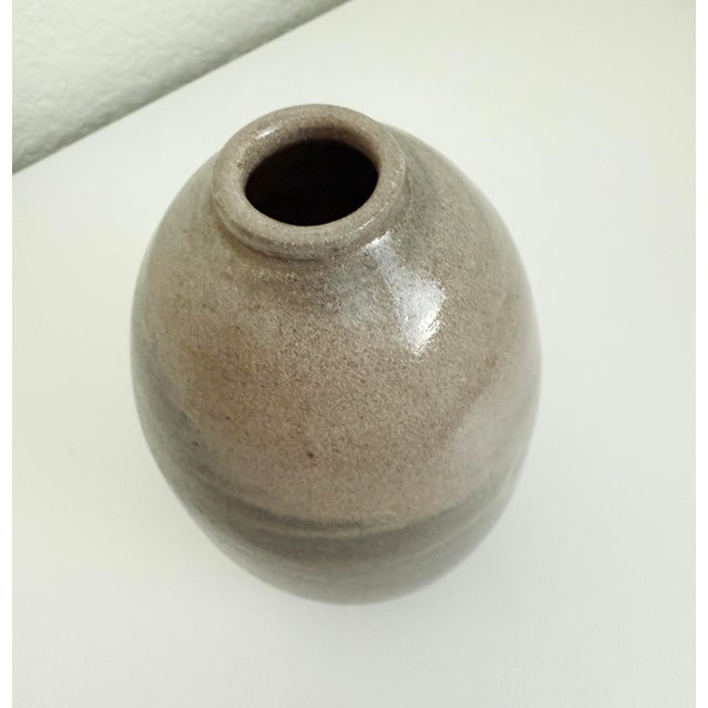 Organic studio pottery clay vase with taupe grey glossy glaze. Artist signed.