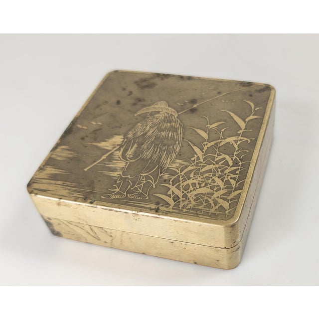 We are selling this Chinese paktong and copper Scholar’s ink box. The top of the box is decorated with an acid etched...
