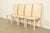 A sleek and stylish set of four Italian Modern or Postmodern high back dining chairs In the manner of Mario Bellini for...