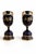 A striking pair of antique Vienna-style porcelain pedestal urns dating to circa 1900. These decorative urns feature a rich...