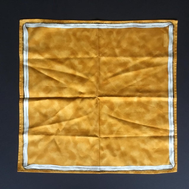 This is a et of two square (19" x 20") napkins made by Pierre Frey in Paris. They are 100% cotton satin ochre/golden...