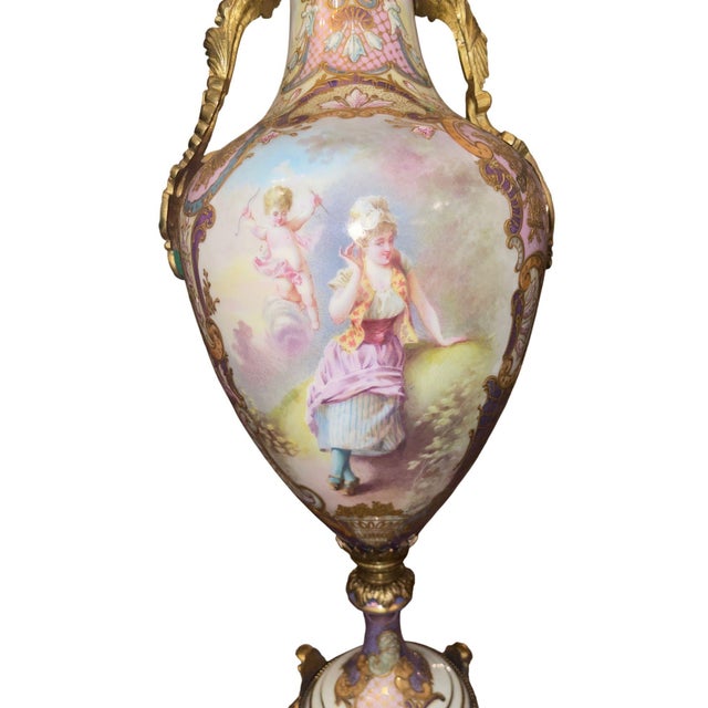 Exceptional 19th-century French Sevres porcelain covered vase, richly decorated with hand-painted romantic scenes and...