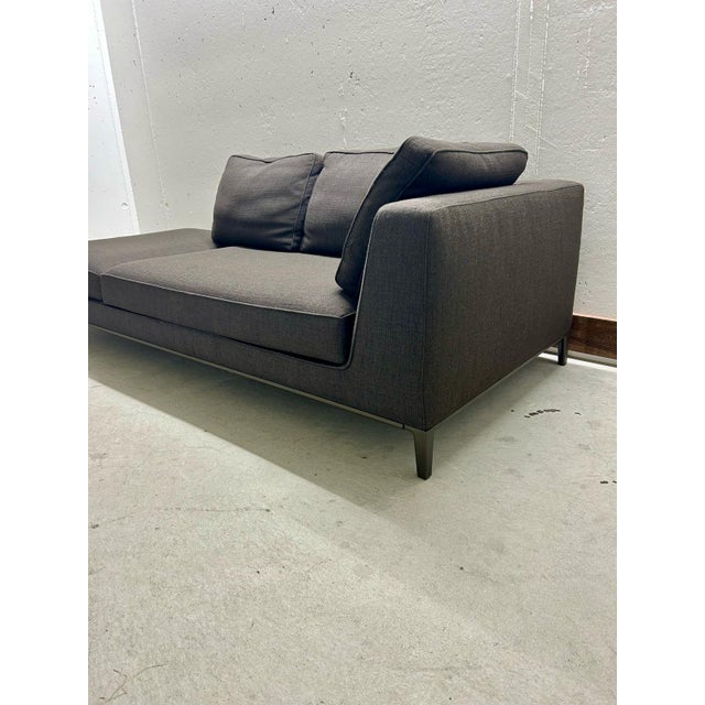 Sofa with chaise lounge from the Maxalto collection by B&B Italia, designed by Antonio Citterio. This stylish sofa from...