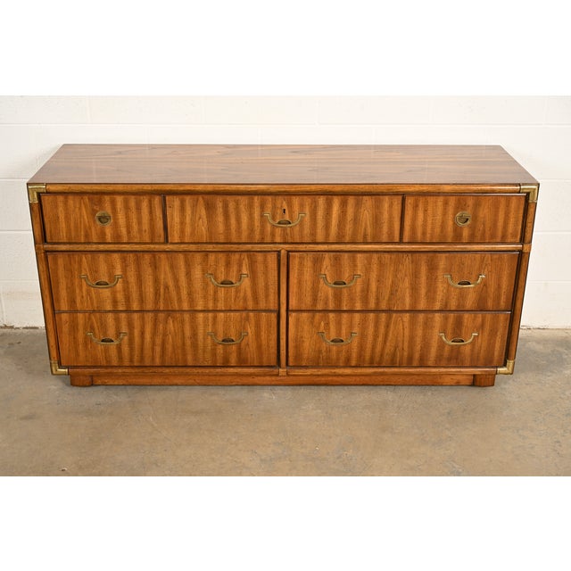 A gorgeous Mid-Century Modern Hollywood Regency Campaign style long dresser, credenza, or chest of drawers By Drexel...