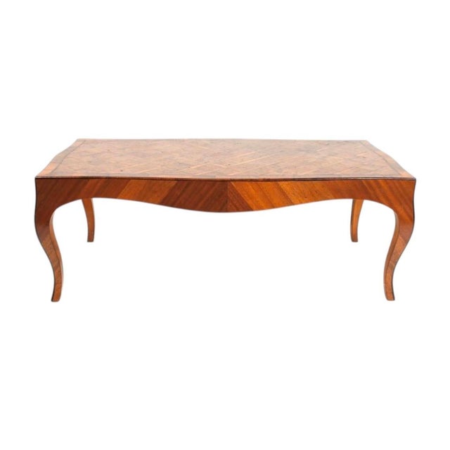Italian parquetry-inlaid coffee table, distinguished by its beautifully figured burlwood veneers, contrasting satinwood...