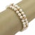 This is a lovely estate pearl bracelet, it is crafted from 14k yellow gold with a textured finish. The piece has a double...