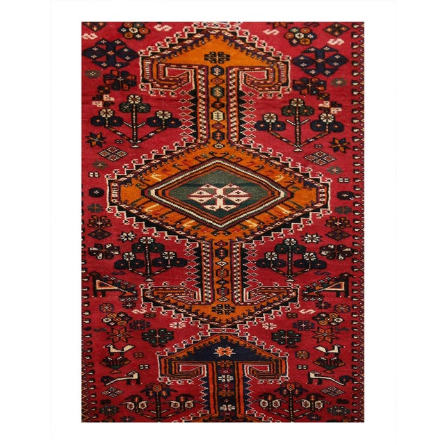 Hand knotted in the village of Serab, northwest Persia in the late 19th century. The rug is made from vegetable dyed wool...