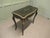 French Louis XV Style Ebonized Games Table with Brass Inlay. This is a very stylish French Table, it has a black ebonized...