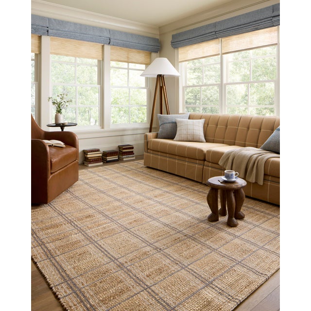 The Judy Collection from Chris Loves Julia x Loloi is a handwoven area rug made with natural fibers for an easygoing yet...