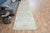 This vintage hand-knotted Runner rug is a semi-antique vintage area rug. The '70s Eastern region of Anatolian's unique rug...