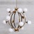 Goldenrod Mid-Century Italian Brass and Opaline Globe Chandelier from Stilnovo For Sale - Image 8 of 9