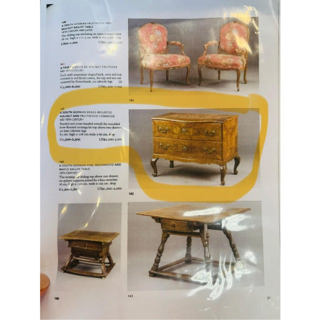 A fabulous south German brass mounted walnut and fruit wood commode mid 18th century. Banded and cross-banded overall the...