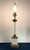 A sophisticated "Statement Piece" in the style of the Marbro Lamp Company. This 1960s Neoclassical column lamp features a...
