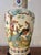 A striking pair of vintage Italian porcelain table lamps featuring beautifully hand-painted chinoiserie decoration. Each...