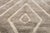Rings of light, radiating from the center. This hand-knotted Moroccan wool rug features a hypnotic pattern of concentric...