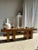 Solid wood bench (teak) with openwork base crossed by a cylinder. Excellent condition, elegant with its simple geometric...