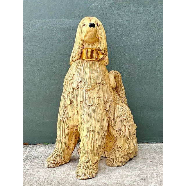 This striking monumental Afghan Hound sculpture captures the elegant silhouette and regal poise of the breed with a bold,...