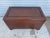 This is a very heavy blanket chest. The chest is constructed of teak. The outer edges and the handles are carved in teak....