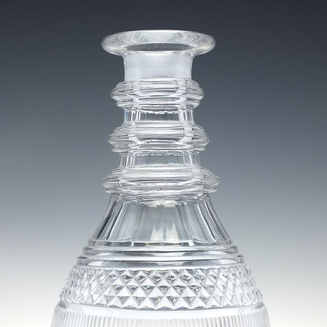 Technical Description A superb pair of Georgian Anglo Irish Prussian glass decanters dating to c1810. They have their...