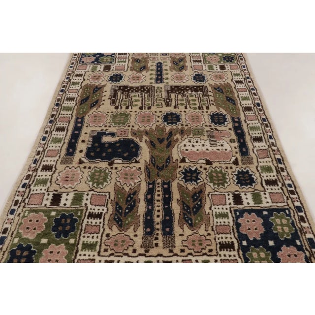 Hand-knotted in premium wool, this 5x8 rug is a vibrant and imaginative addition to Rug & Kilim’s Scandinavian collection....
