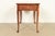 A gorgeous Queen Anne style occasional side table, nightstand, or tea table By Baker Furniture USA, Circa 1980s Walnut,...