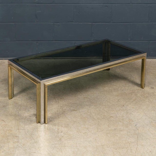 A stylish coffee table by belgo chrom, belgium, dating to the 1970s. Renowned for their sophisticated use of metal and...