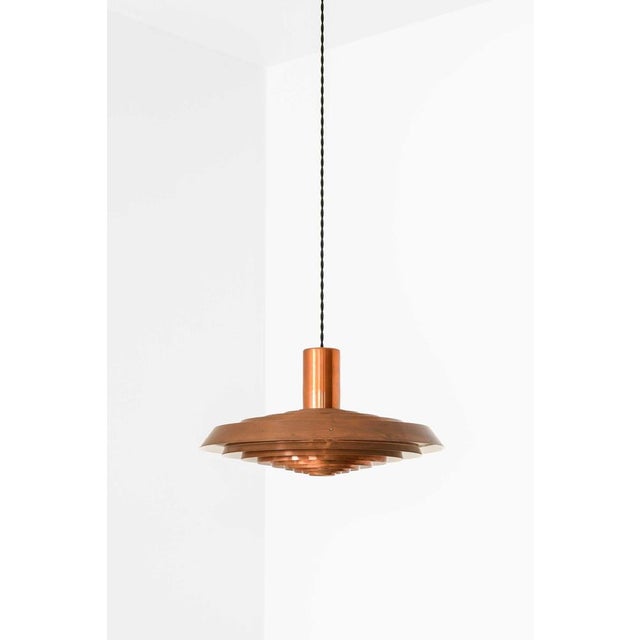 The langelinie ceiling lamp, designed by poul henningsen and produced by louis poulsen in denmark, is a rare and...